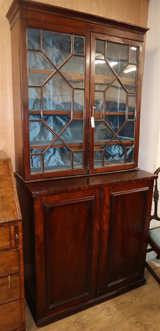 A Victorian mahogany bookcase / cupboard, W.96cm